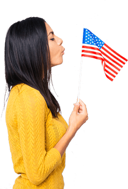 Chica soplando bandera Estados Unidos